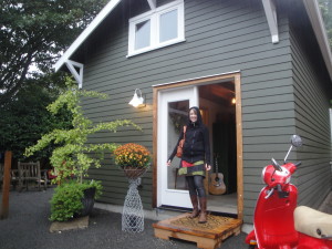 Architect Emily Refi at front of Studio- complete with Vespa scooter!
